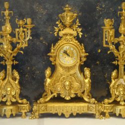 A gilded french clock set