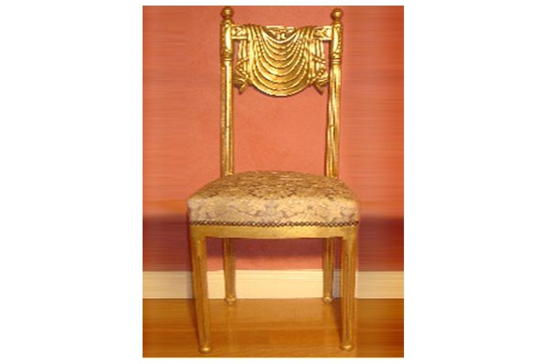 Gold leaf gilded chair.