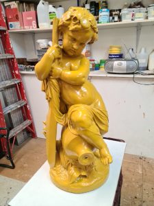 Boy and Paddle Statue with 24k Gold Leaf