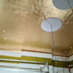 Faux gold leaf over a sprawling 30-square-meter ceiling.