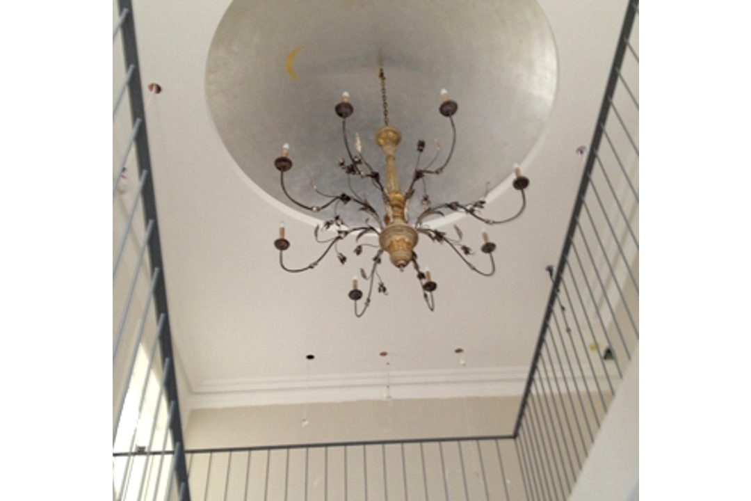 Faux silver leafed dome.