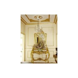 A gold gilded console table and mirror.