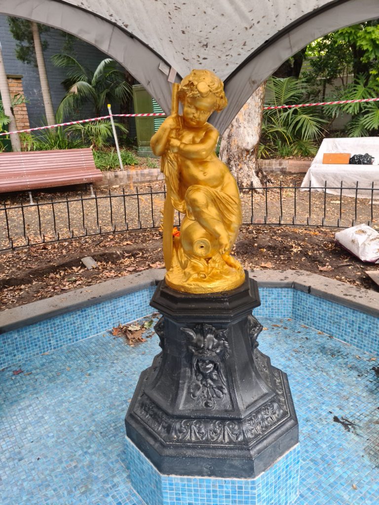 Boy and Paddle Statue with 24k Gold Leaf