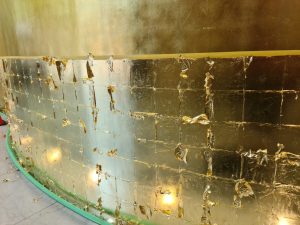 A gold-leafed wall in an office building at number 2 Bulletin Street, Sydney.
