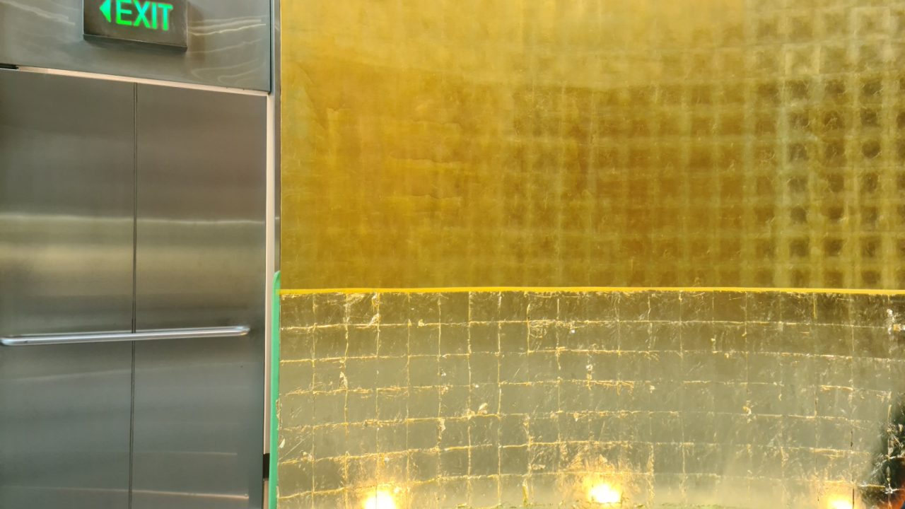 A gold-leafed wall in an office building at number 2 Bulletin Street, Sydney.