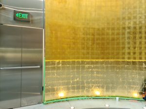 A gold-leafed wall in an office building at number 2 Bulletin Street, Sydney.