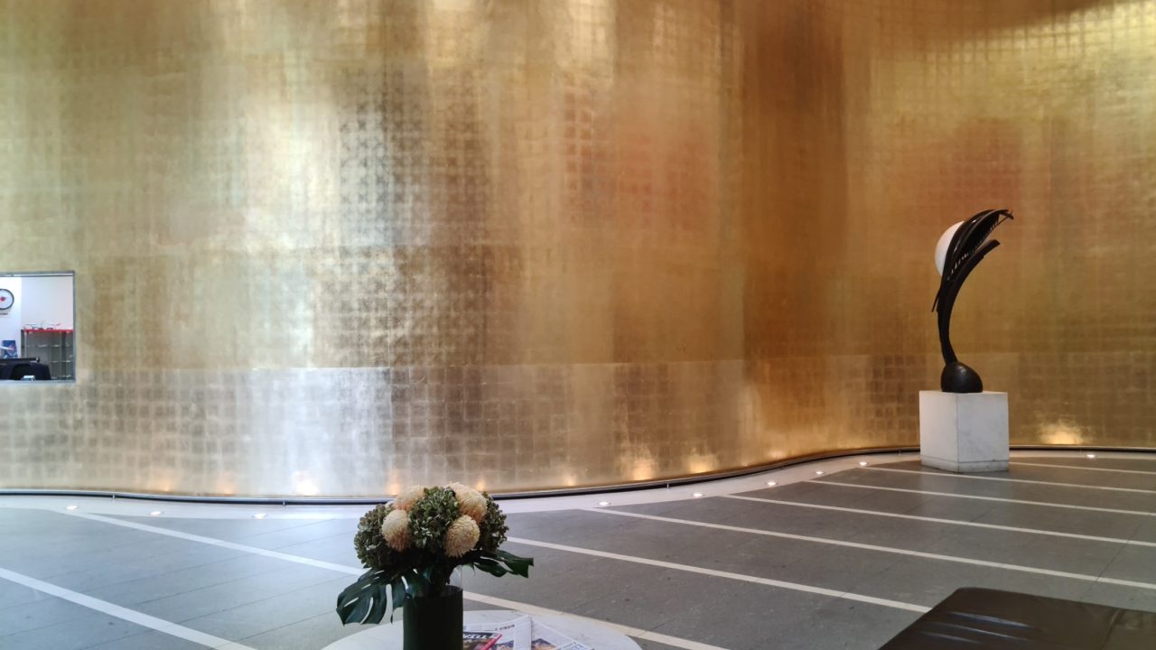 A gold-leafed wall in an office building at number 2 Bulletin Street, Sydney.