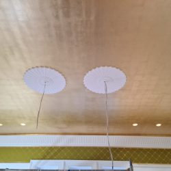 Faux gold leaf over a sprawling 30-square-meter ceiling.
