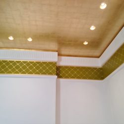 Faux gold leaf over a sprawling 30-square-meter ceiling.