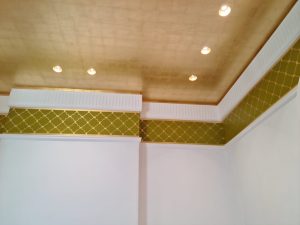 Faux gold leaf over a sprawling 30-square-meter ceiling.
