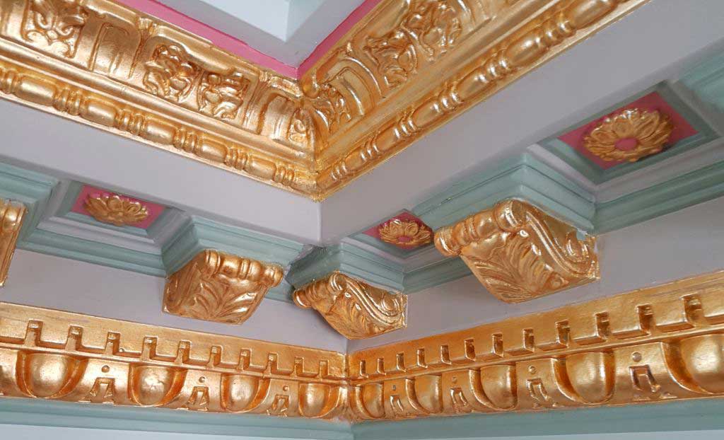 Ornate gilding in a heritage ballroom
